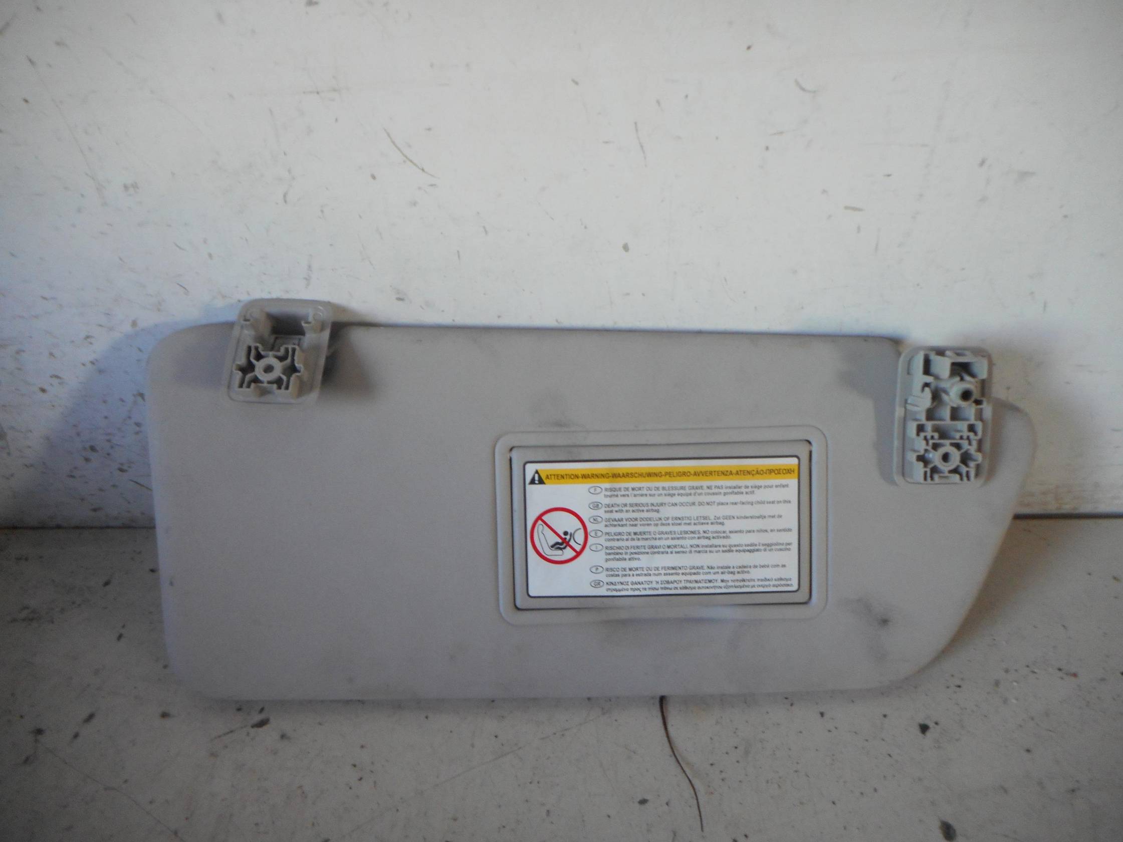 Aletta parasole parabrezza dx.